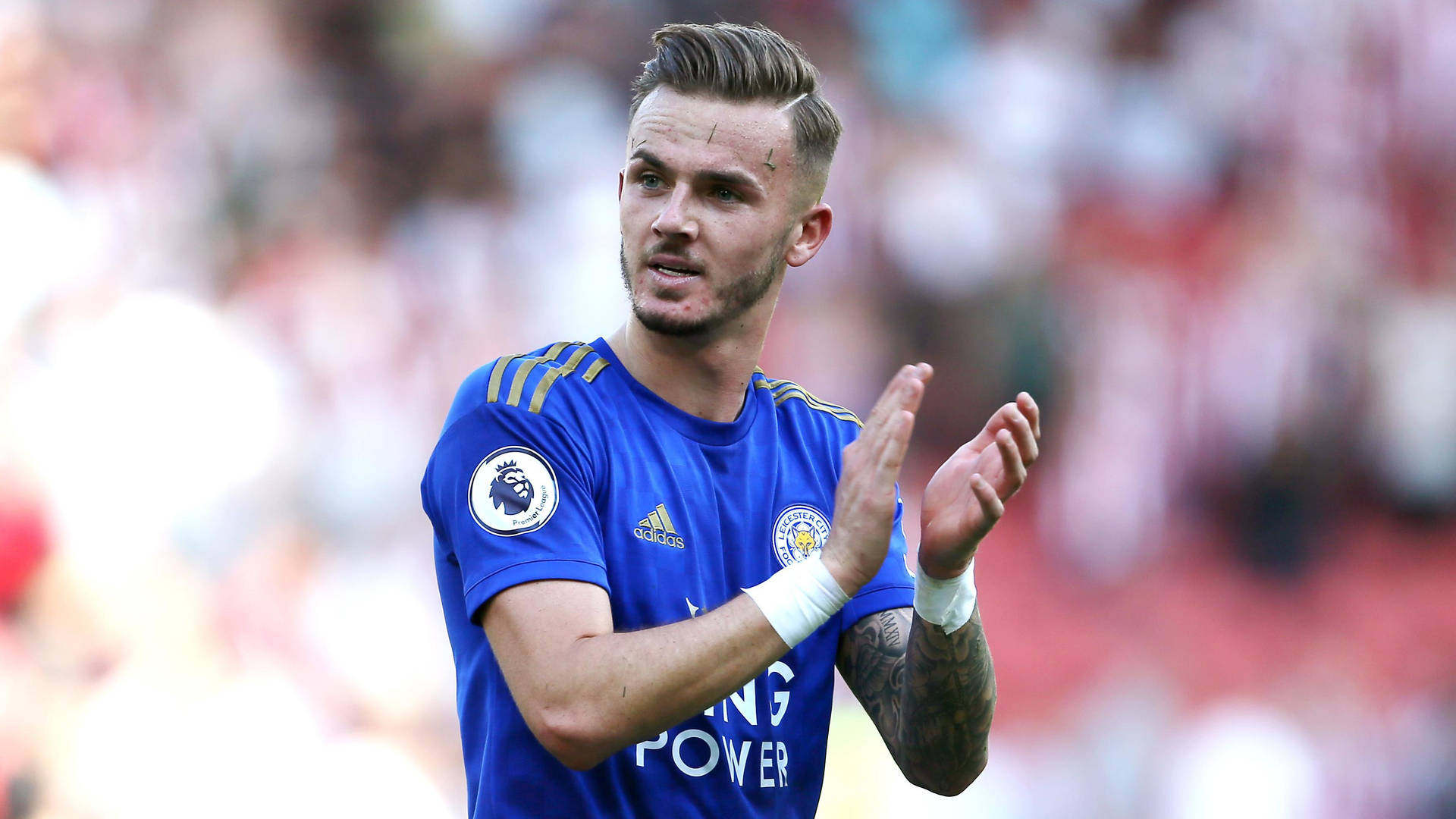 Caption: James Maddison Celebrating A Victory Background