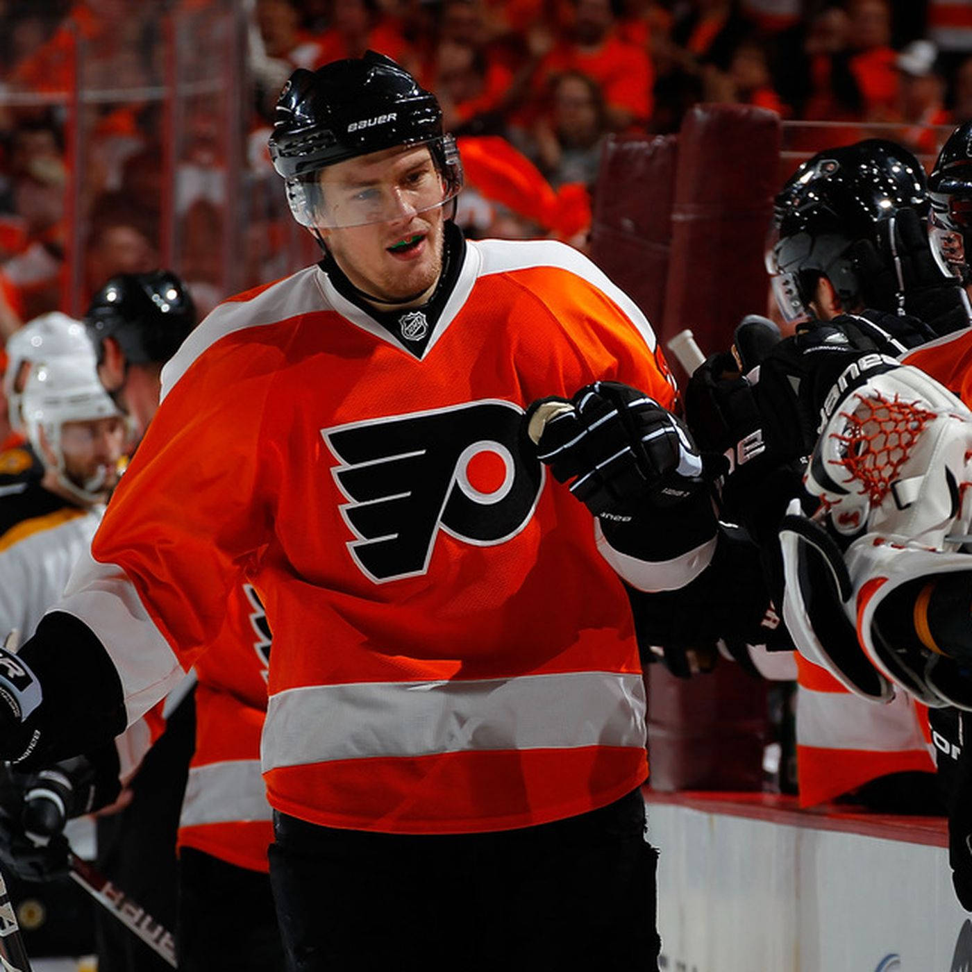 Caption: James Van Riemsdyk Posing In His Philadelphia Flyers Uniform Background