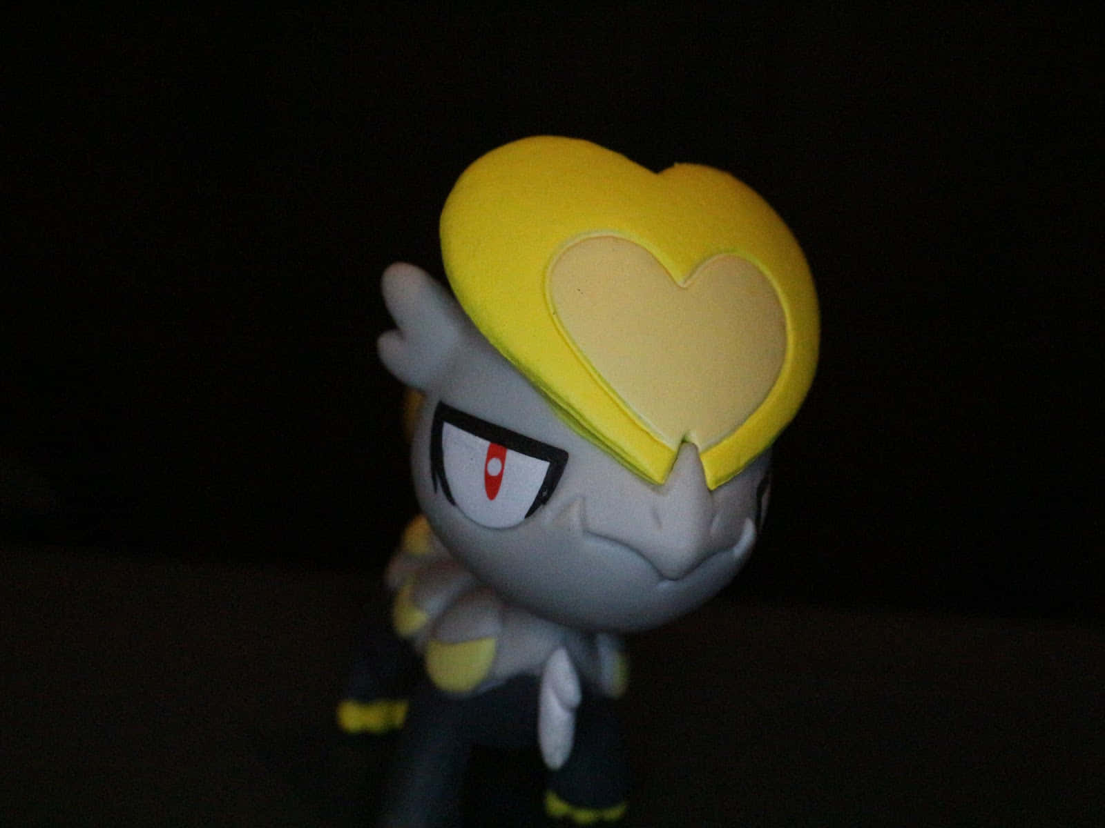 Caption: Jangmo-o, The Scaly Pokémon In Full Glory Background