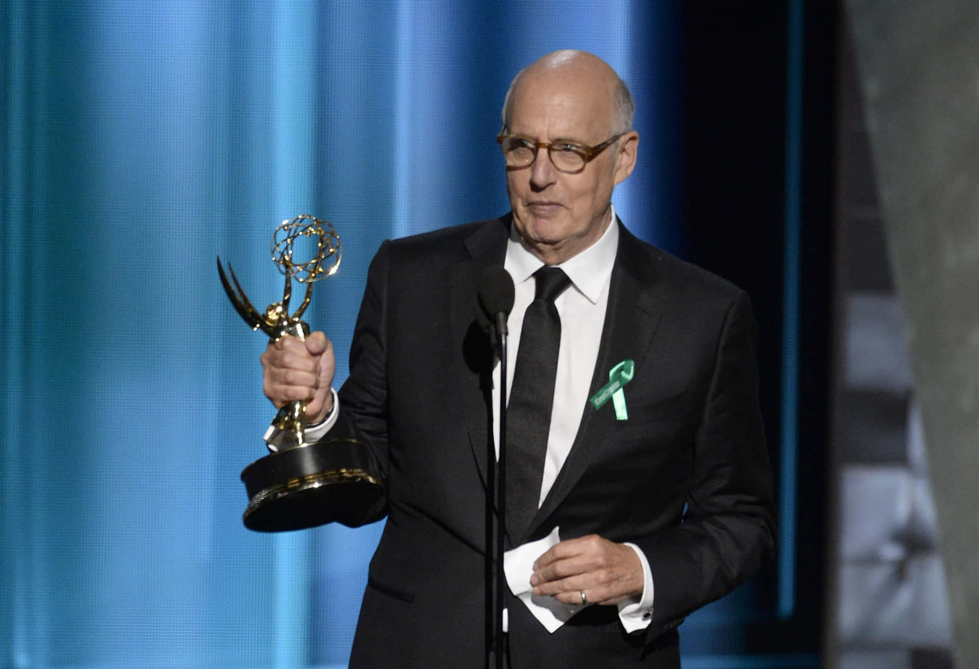 Caption: Jeffrey Tambor In A Poised And Confident Look