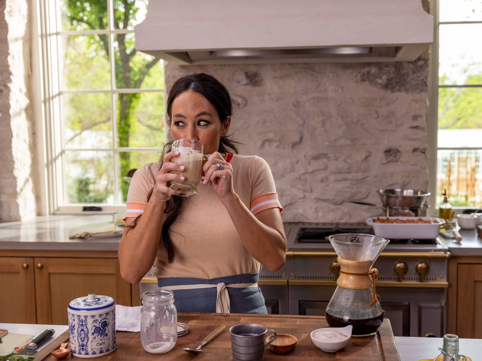 Caption: Joanna Gaines Enjoying Her Coffee Time Background