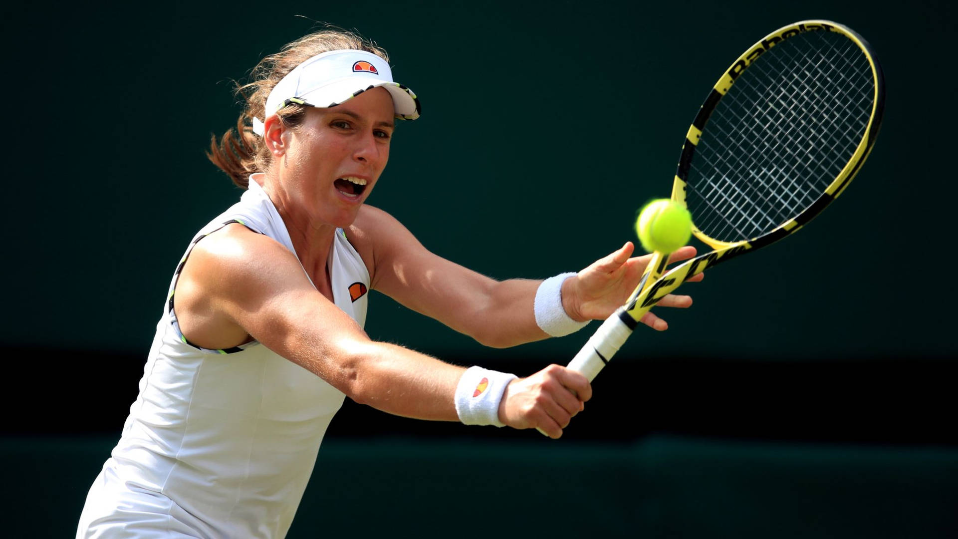 Caption: Johanna Konta Makes Impressive Backhand Return In Tennis Match