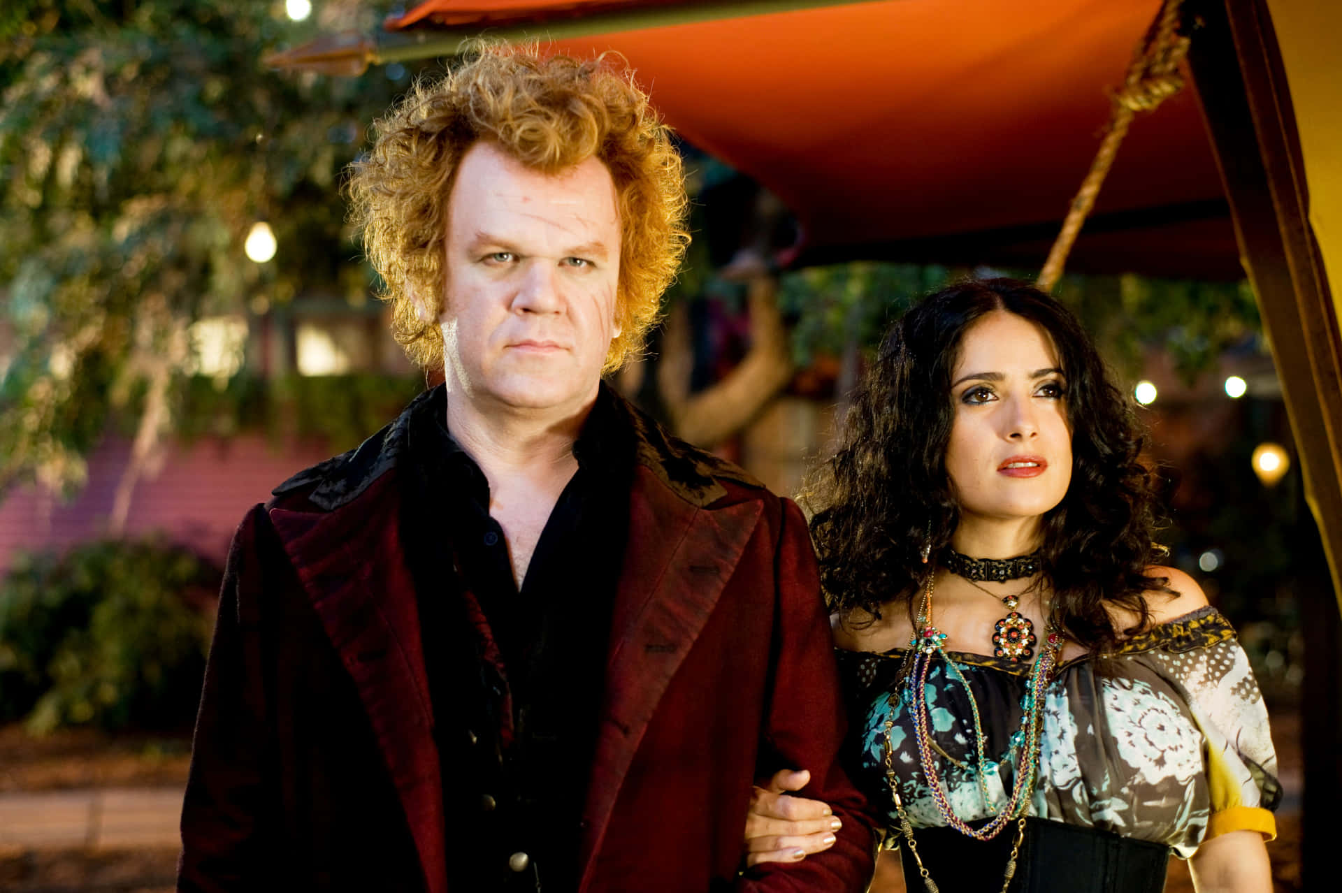 Caption: John C. Reilly Standing Tall In A Red Carpet Event. Background
