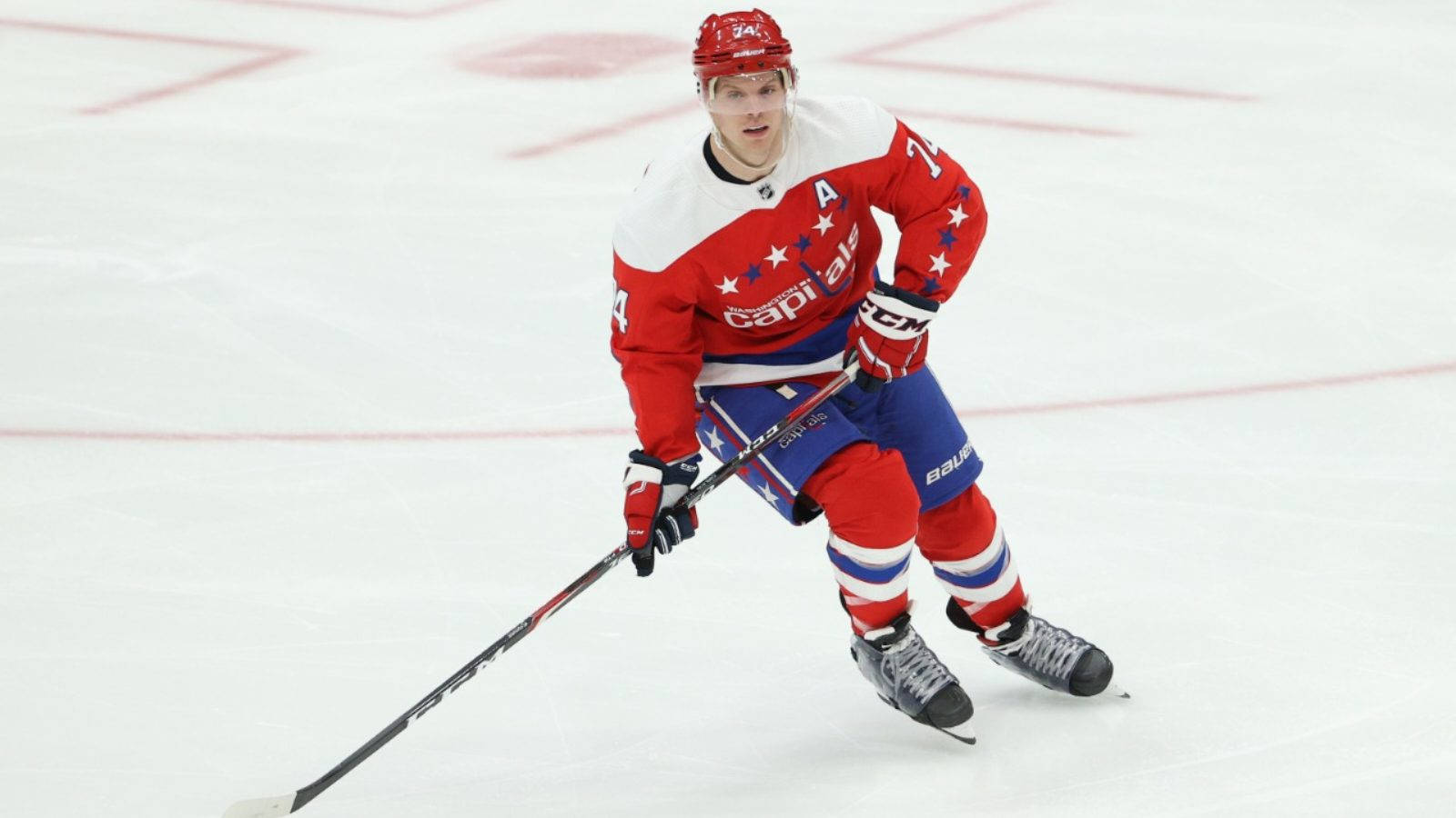 Caption: John Carlson In Action At Capital One Arena Background