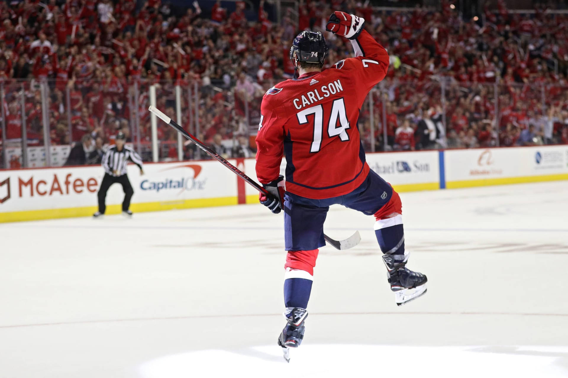 Caption: John Carlson Of Washington Capitals Celebrates Scoring A Goal Background