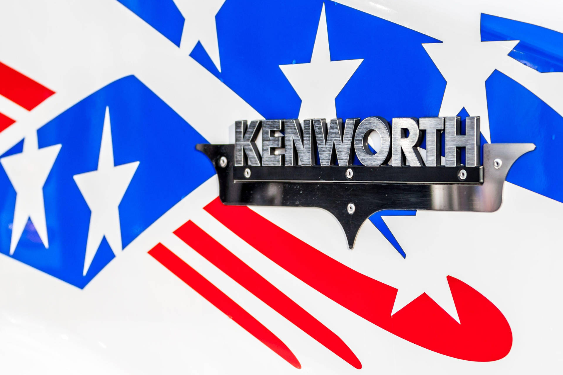 Caption: Kenworth Brushed Metal Logo Background