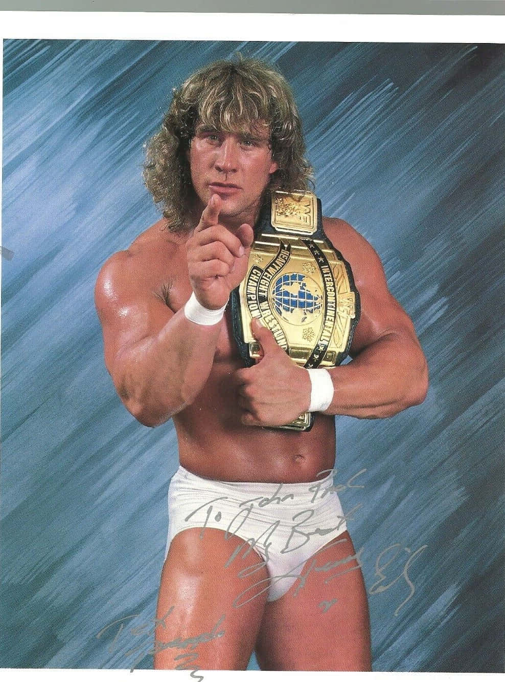 Caption: Kerry Von Erich Celebrates With His Nwa World Heavyweight Championship Belt. Background