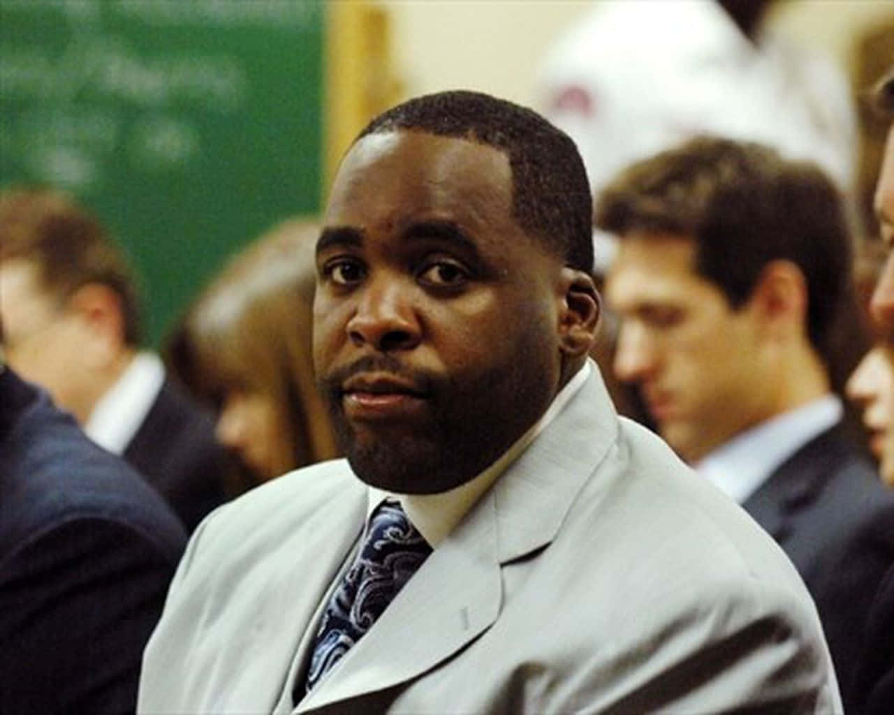 Caption: Kwame Kilpatrick During A Public Event Background