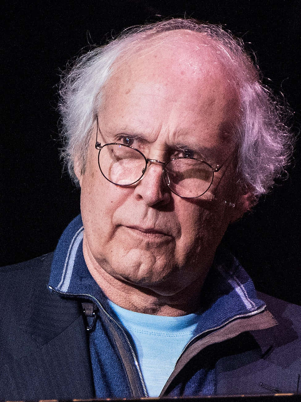 Caption: Legendary Comedian Chevy Chase Background