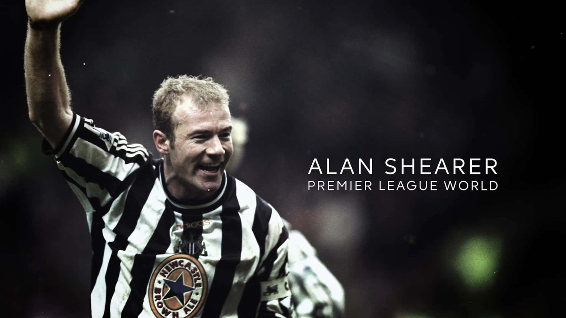 Caption: Legendary Football Star, Alan Shearer In His Premier League Glory Days. Background