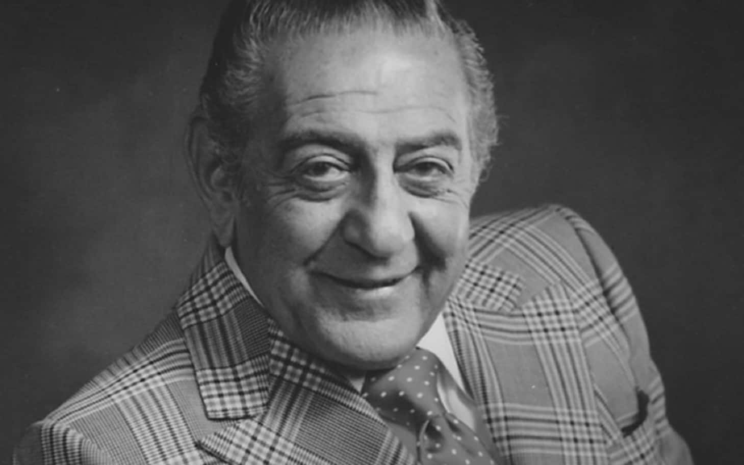 Caption: Legendary Music Maestro - Guy Lombardo In Black And White Background