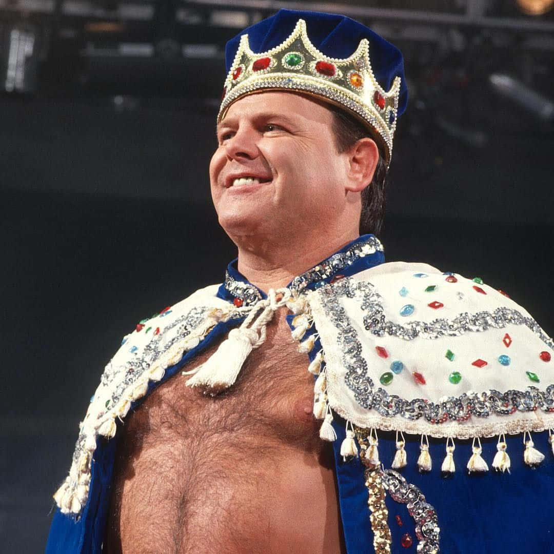 Caption: Legendary Wrestler Jerry Lawler In The Ring Background