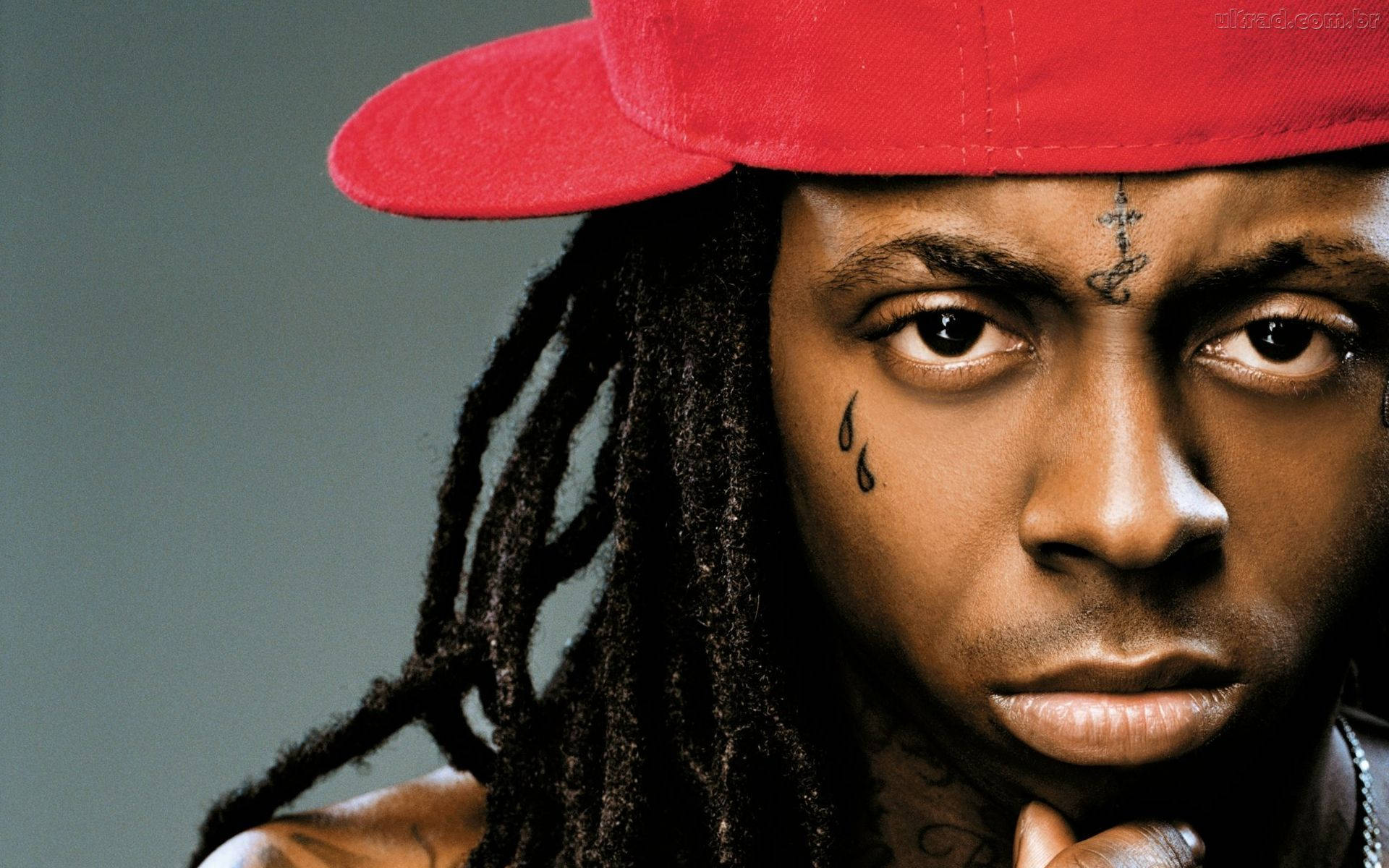 Caption: Lil Wayne Performing On Stage Background