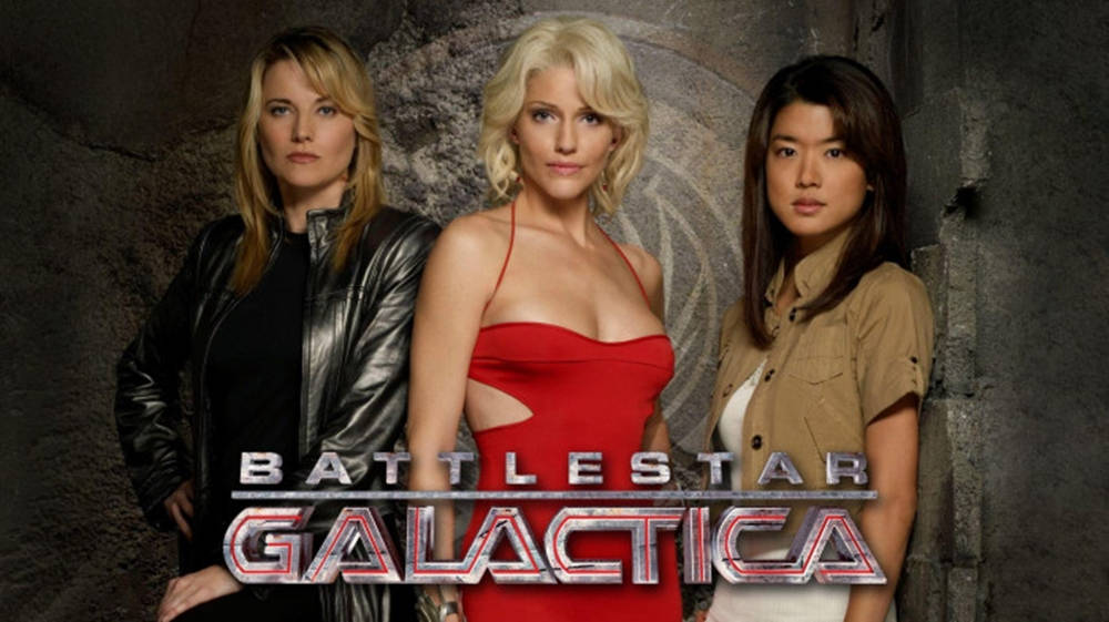 Caption: Lucy Lawless In The Iconic Galactica Movie Poster Background