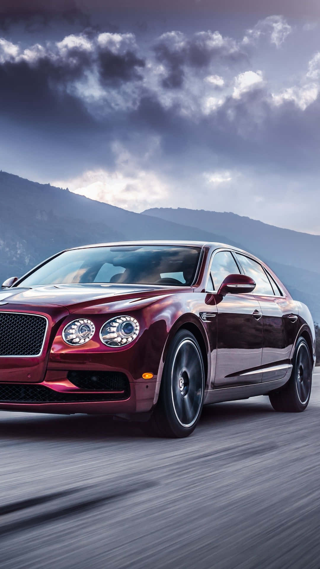 Caption: Luxury In Hand - A Bently Iphone Experience Background