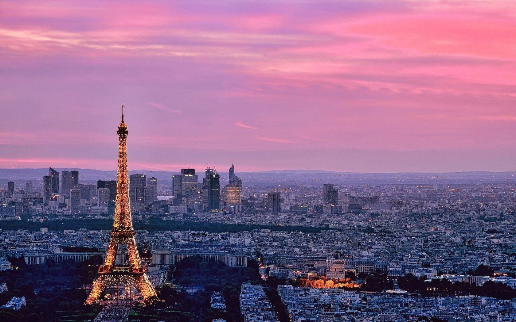 Caption: Magical Twilight Over Pink Eiffel Tower Background
