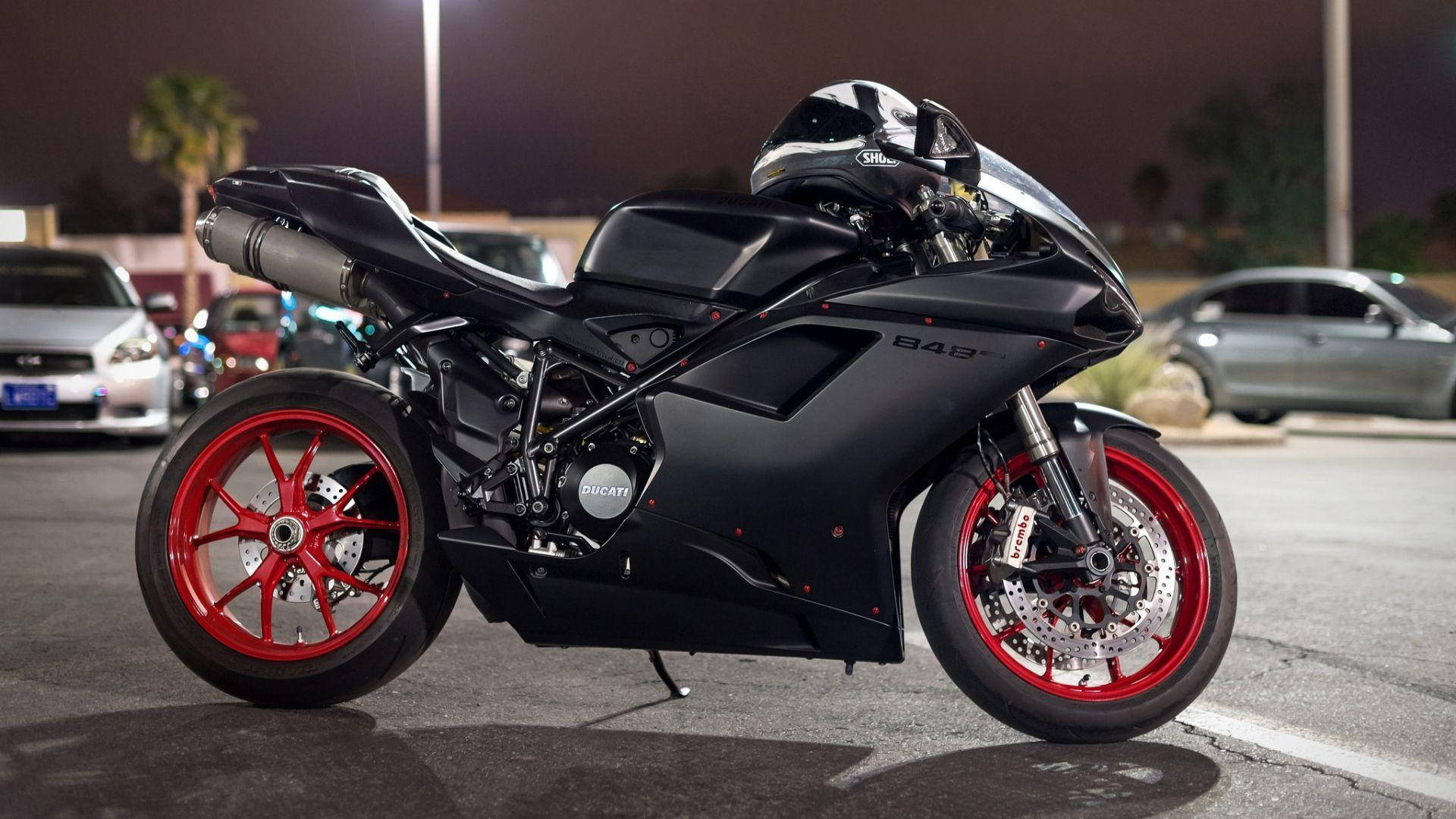 Caption: Majestic Black Ducati 848 Bike In Hd Background