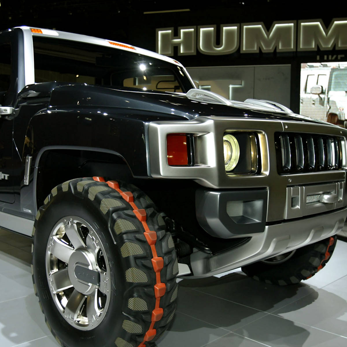 Caption: Majestic Black Hummer H3t In High Resolution Background