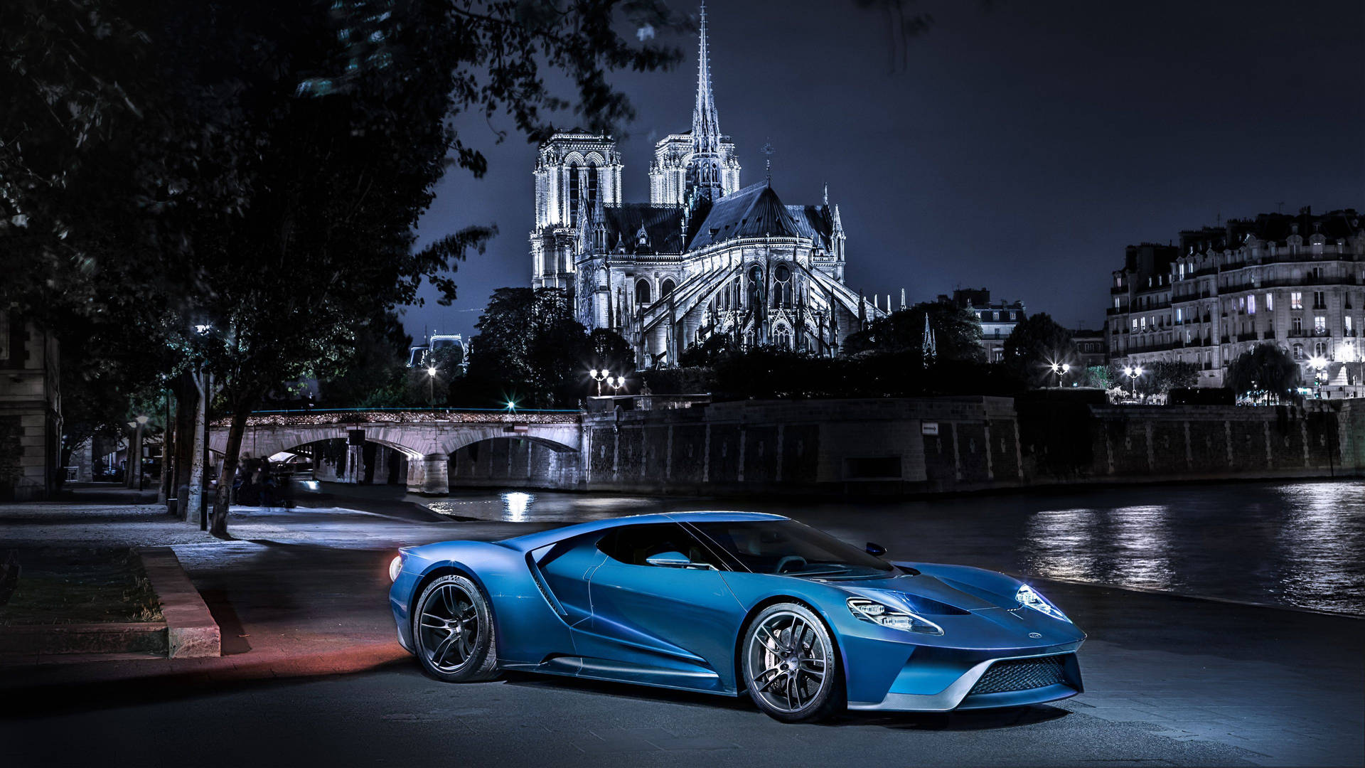 Caption: Majestic Blue Ford Gt Supercar In Its Stunning Glory Background