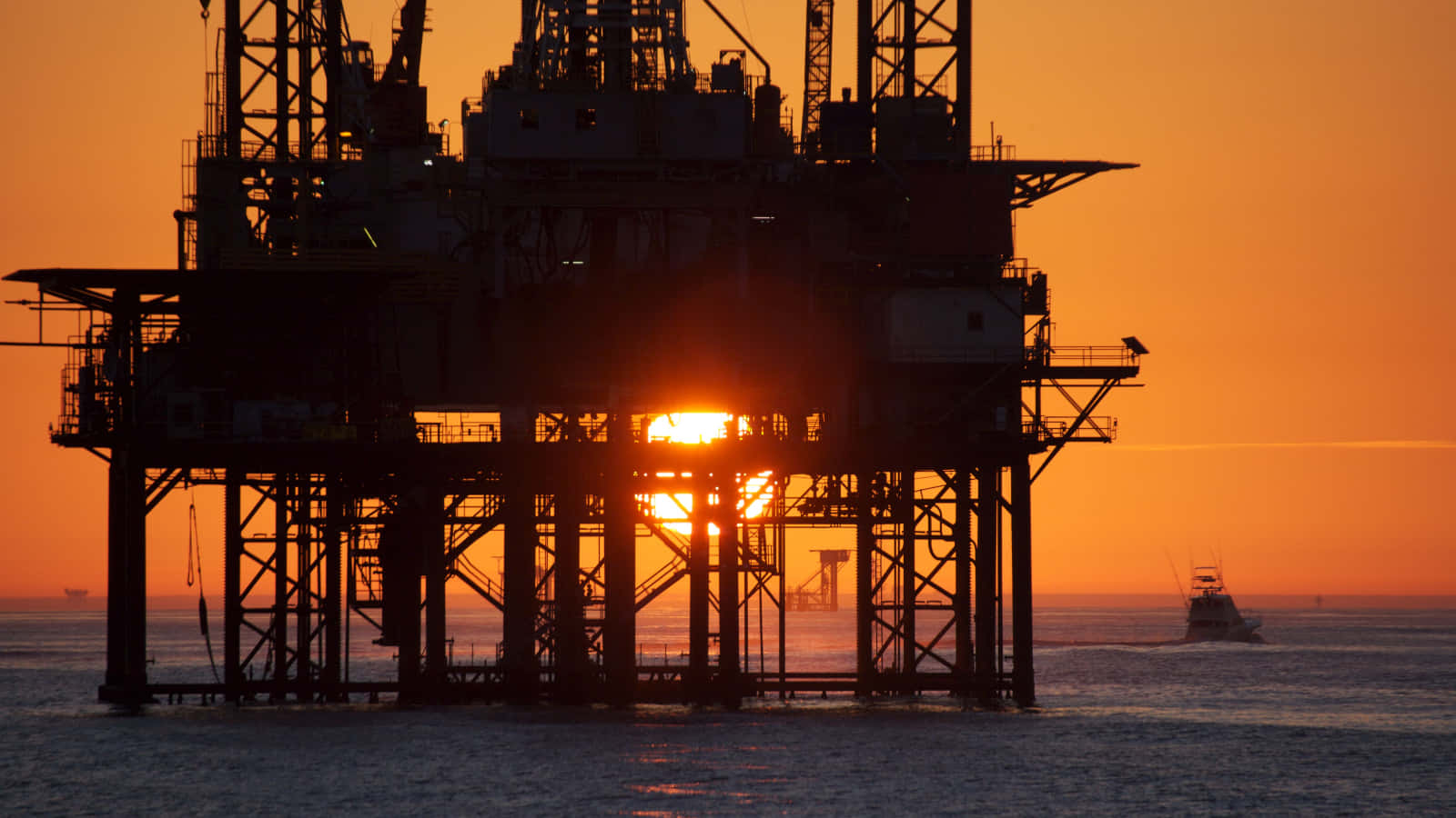 Caption: Majestic Dawn Over North Dakota Oil Rig Background