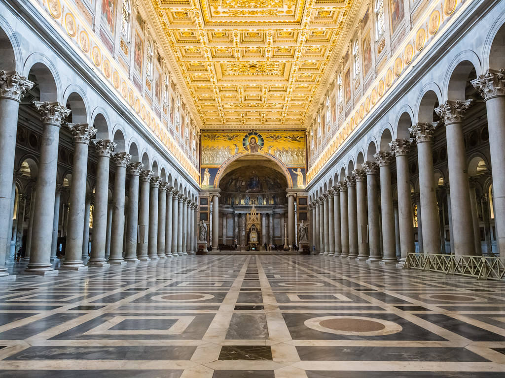 Caption: Majestic Interior Of St. Paul Basilica, Rome Background