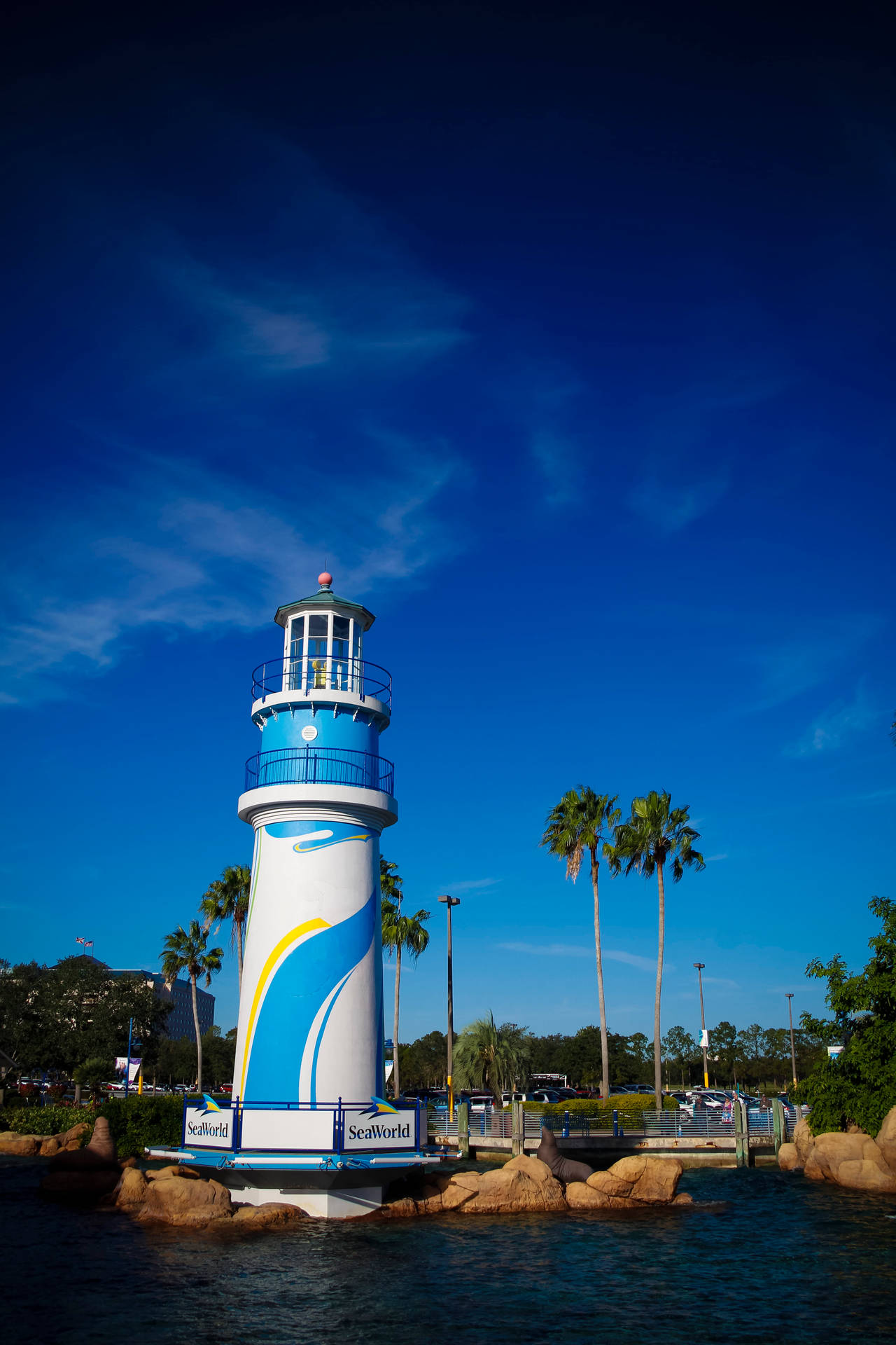 Caption: Majestic Lighthouse At Seaworld, Orlando Background