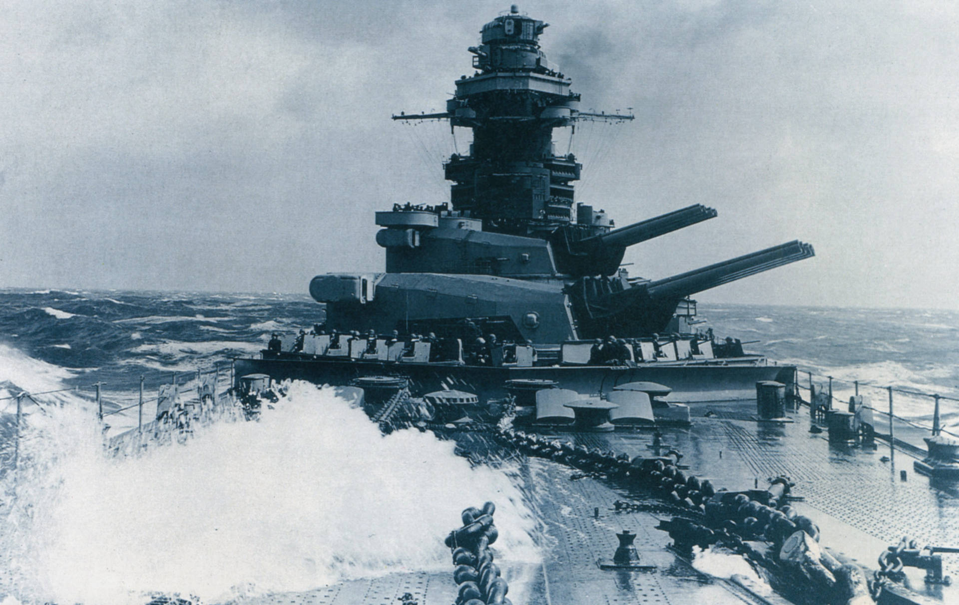 Caption: Majestic Navy Warship Anchored In French Polynesia Background