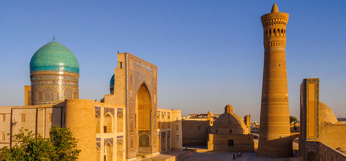 Caption: Majestic Poi Kalan Mosque Complex In Ancient Bukhara