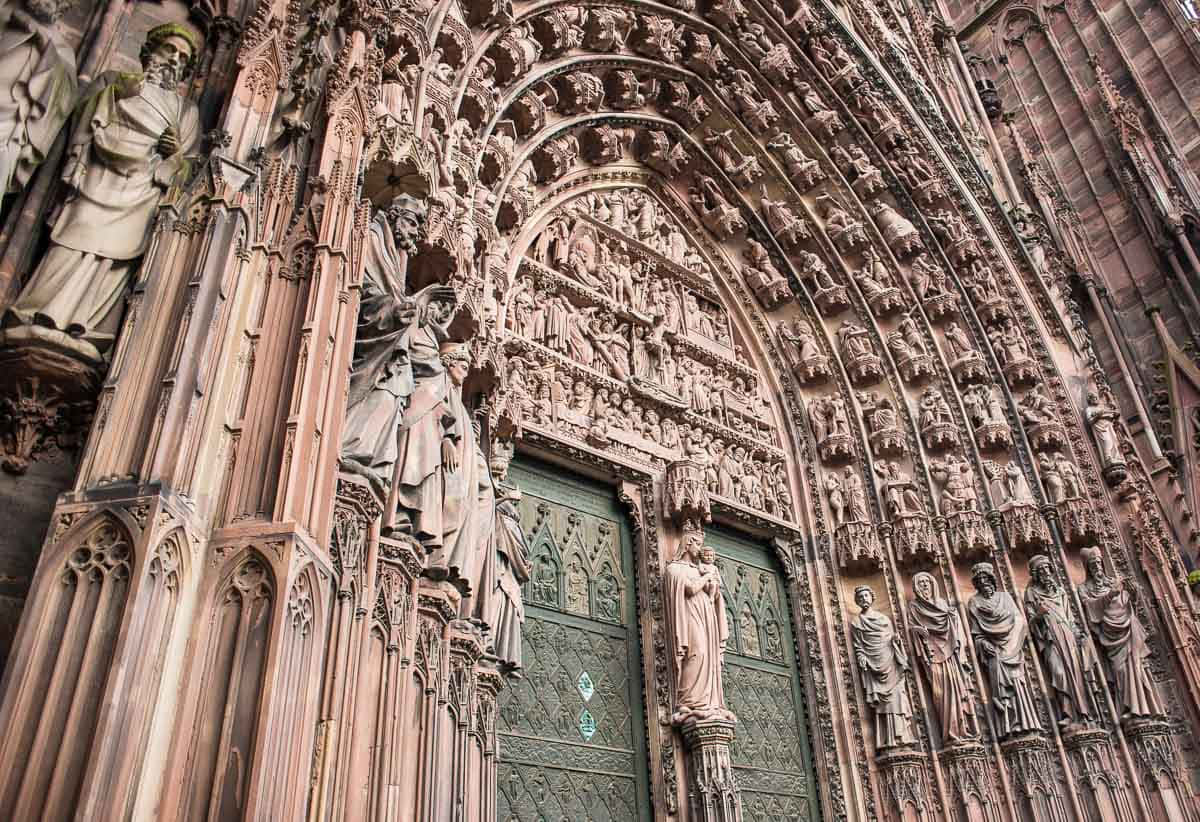 Caption: Majestic Strasbourg Cathedral Against A Clear Blue Sky Background