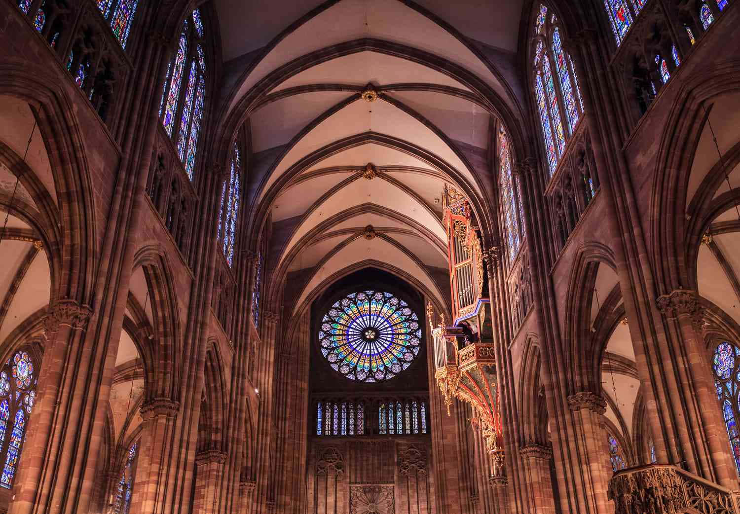Caption: Majestic Strasbourg Cathedral In France At Dusk Background