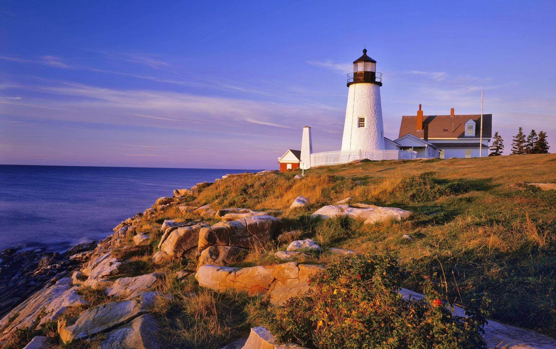 Caption: Majestic Twilight At The Lighthouse Background