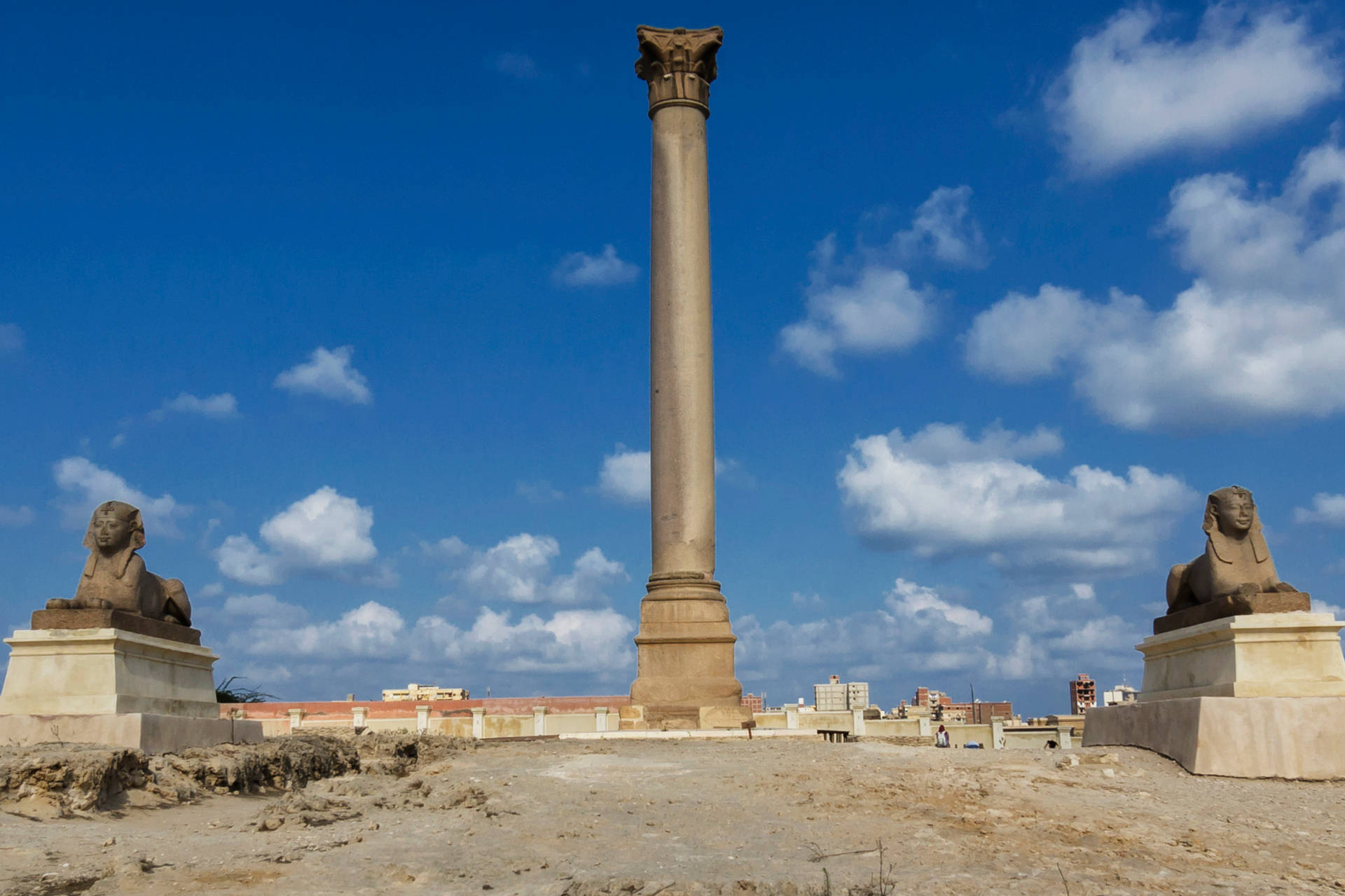 Caption: Majestic View Of Pompey's Pillar In Alexandria Background