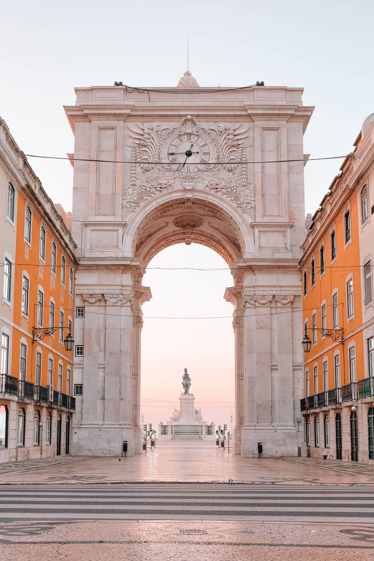 Caption: Majestic View Of Praca Do Comercio Arc In Lisbon Background