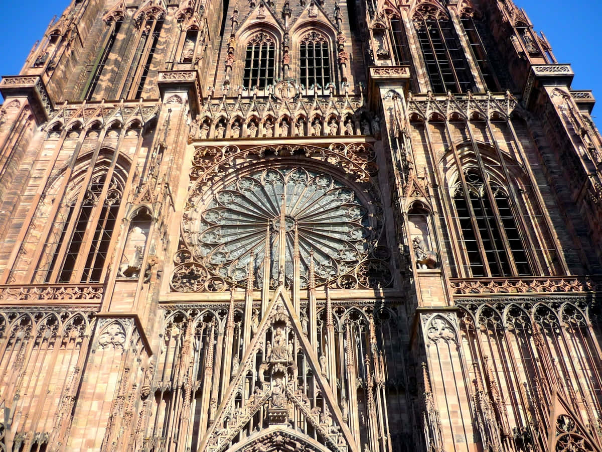 Caption: Majestic View Of Strasbourg Cathedral, France Background