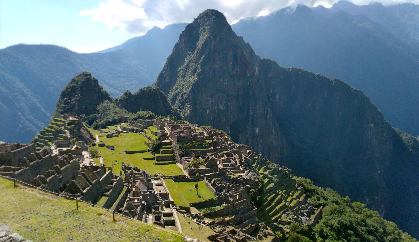 Caption: Majestic View Of The Ancient Incan City, Machu Picchu Background