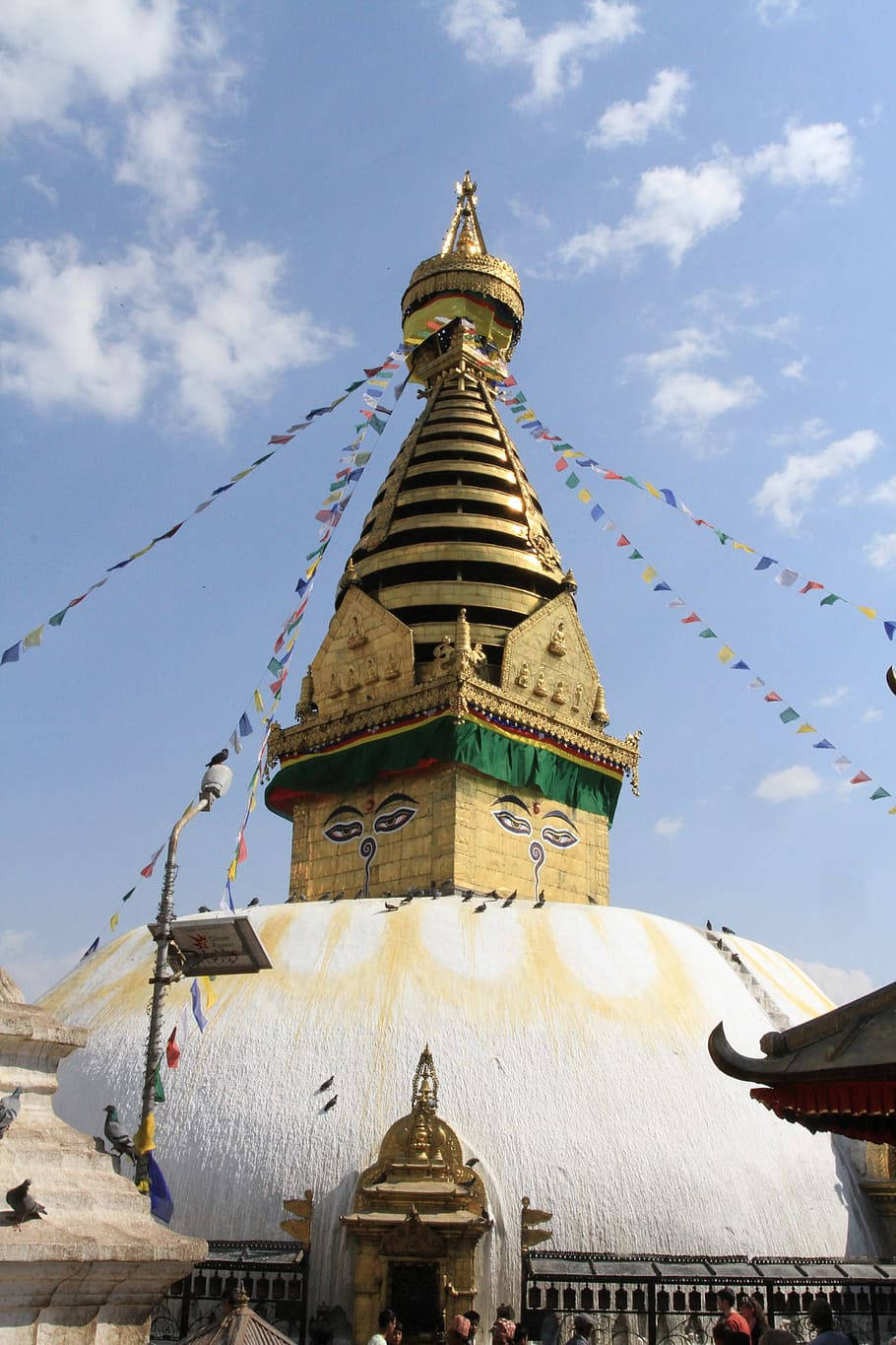 Caption: Majestic View Of The White And Yellow Stupa In Kathmandu.