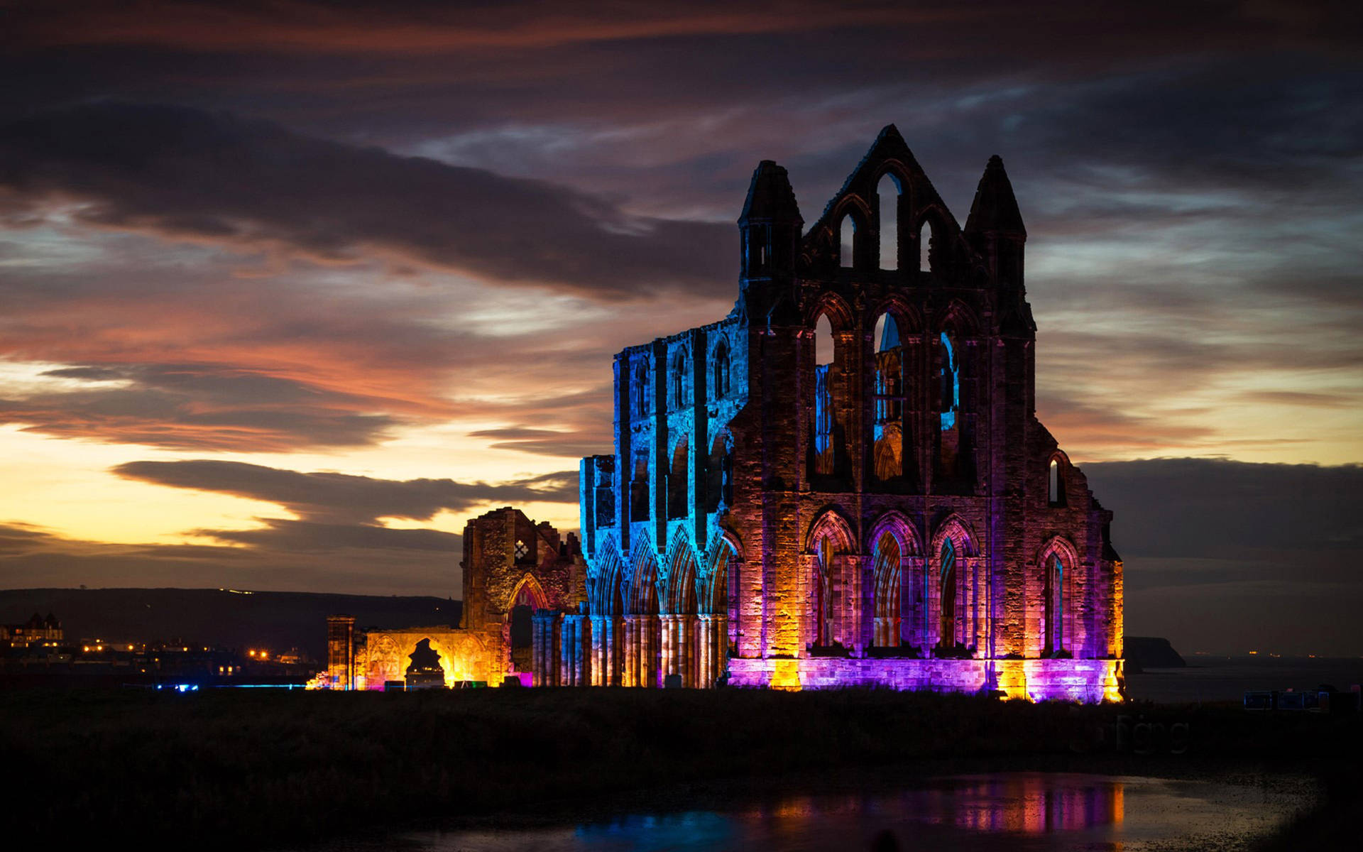 Caption: Majestic View Of Whitby Abbey In Yorkshire Background
