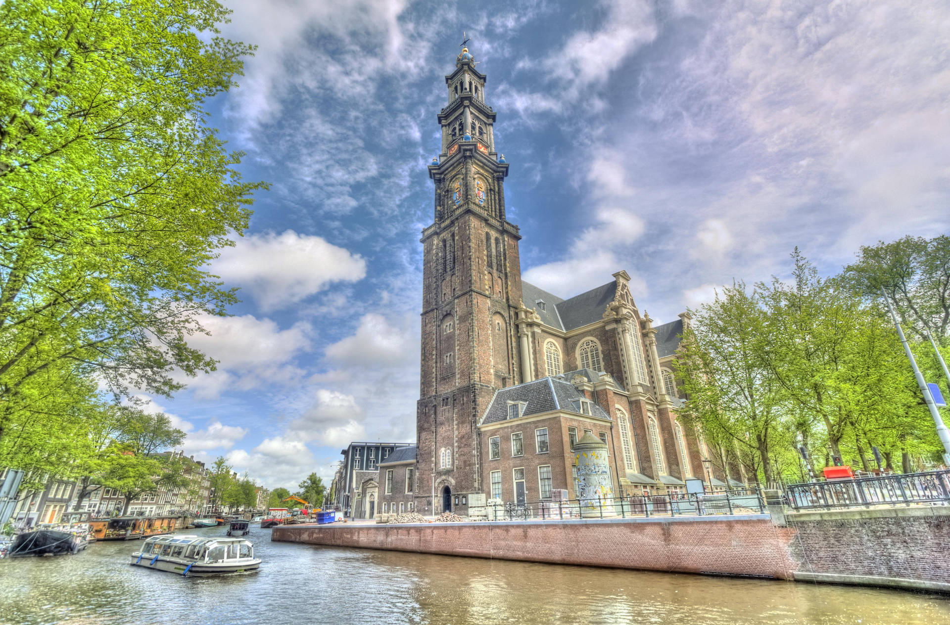 Caption: Majestic Westerkerk Tower, Amsterdam Background