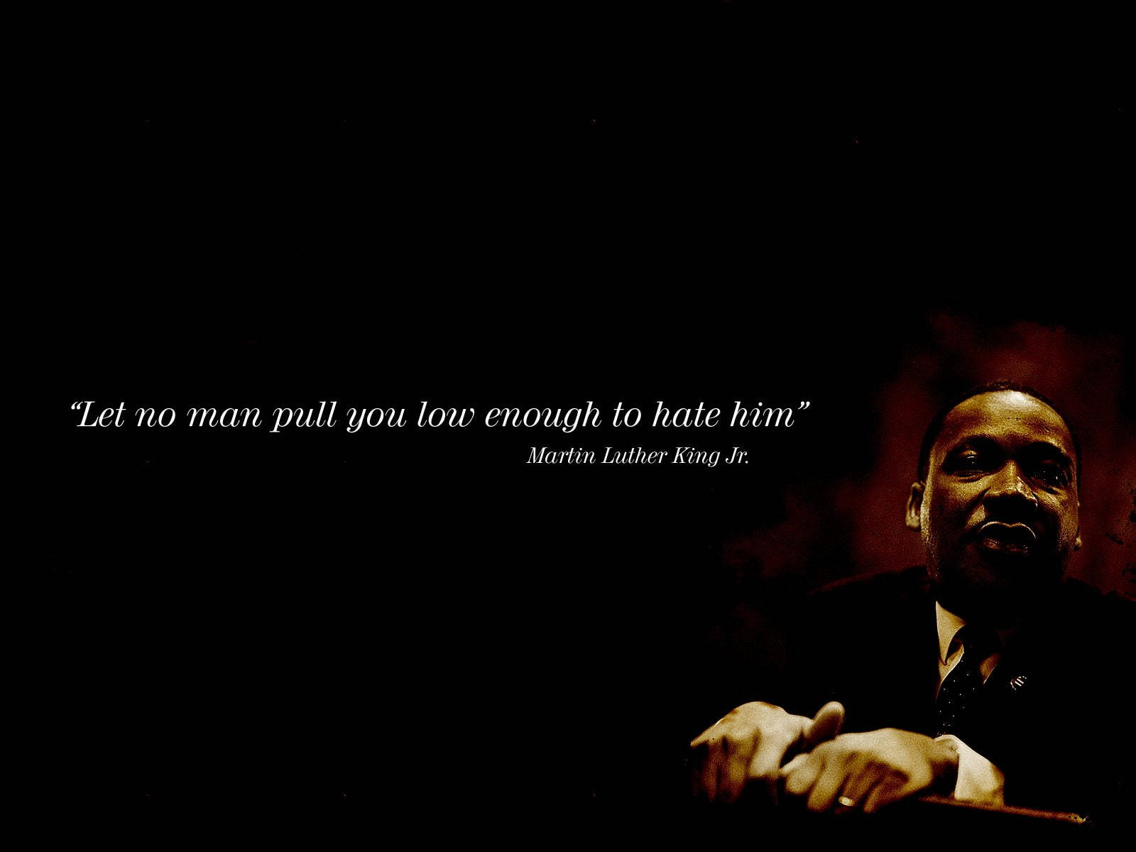 Caption: Martin Luther King Jr. Quoting Memorable Words Of Wisdom Background