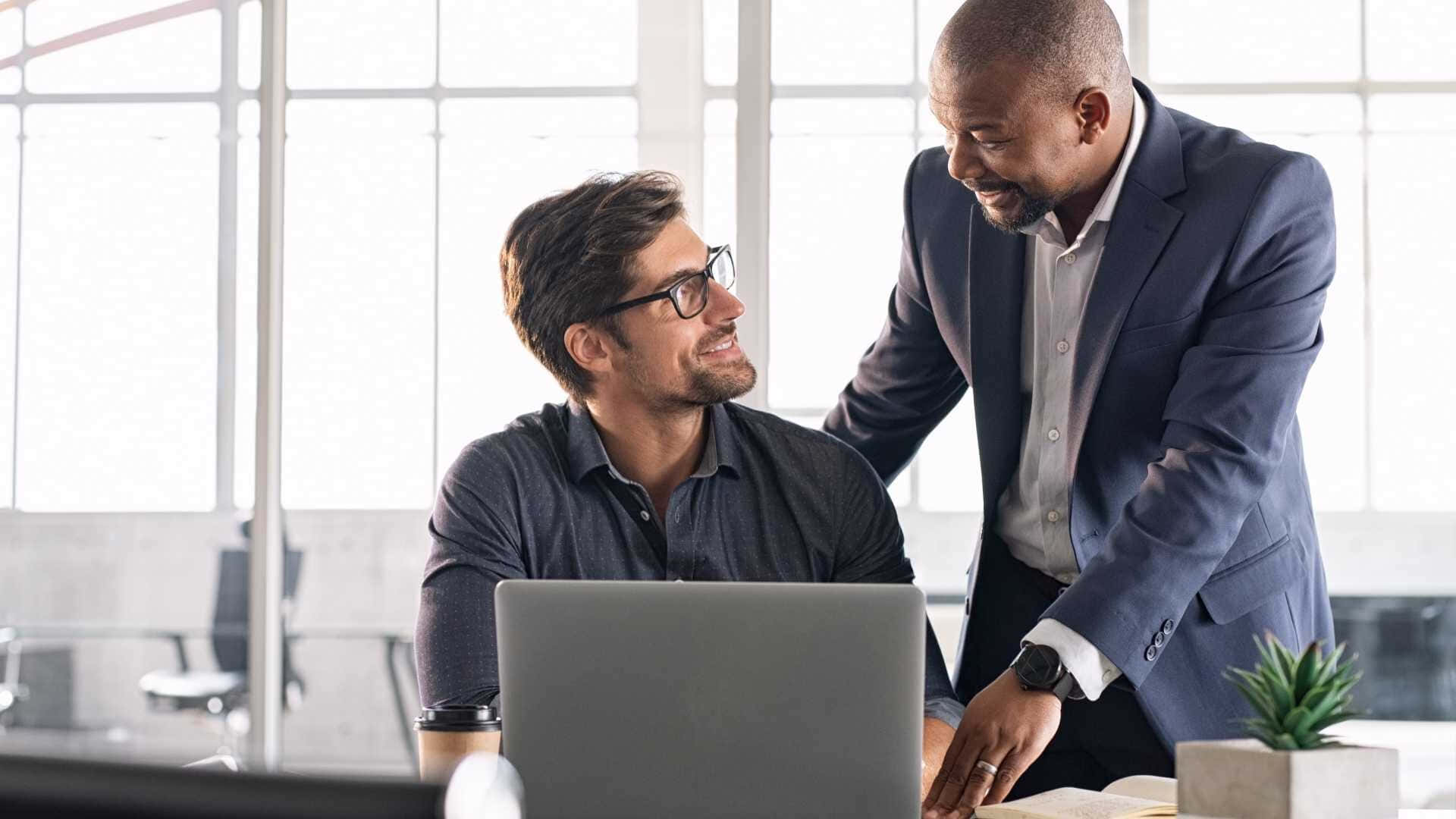 Caption: Mentor Assisting Struggling Apprentice Background