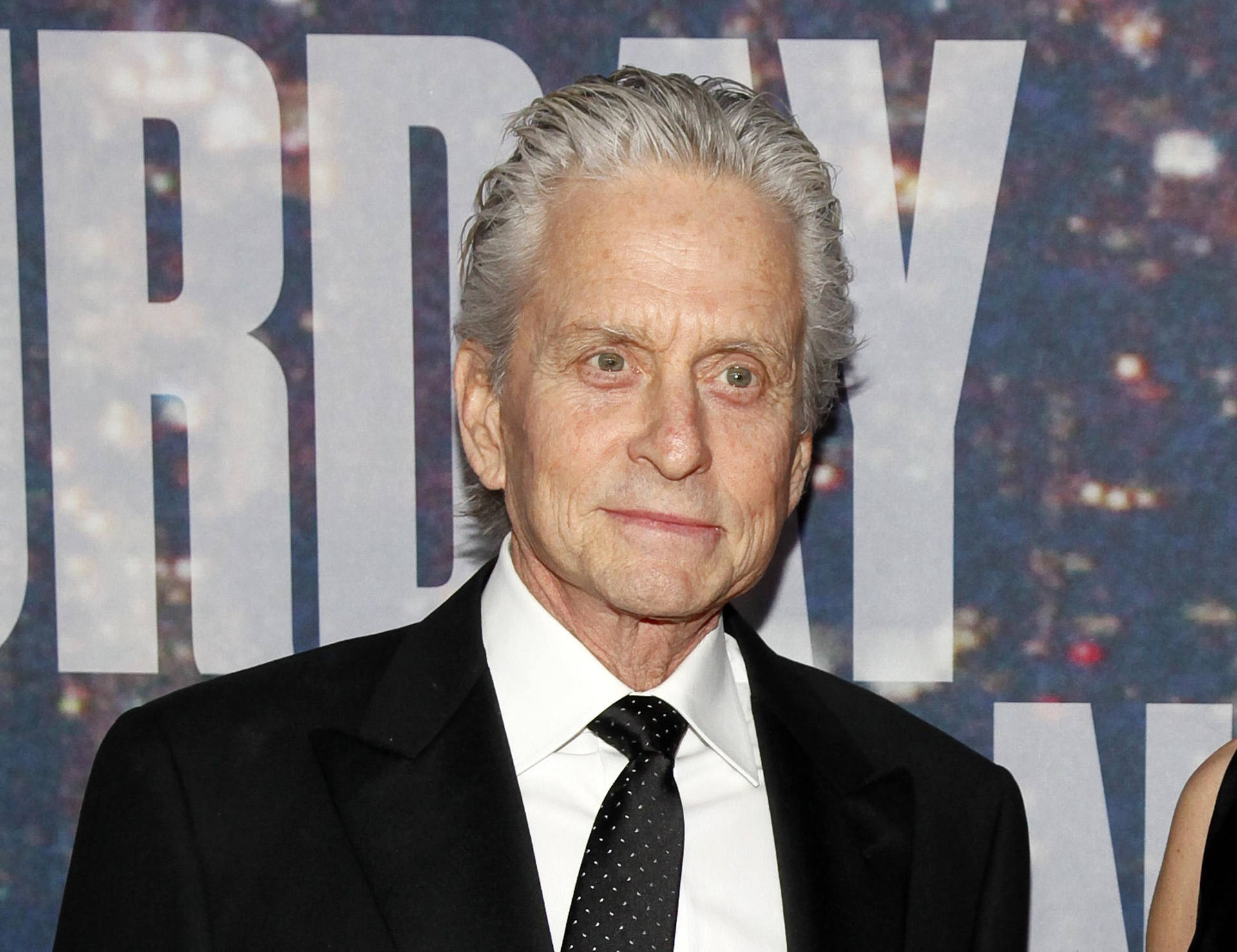 Caption: Michael Douglas At The Primetime Emmy Awards Background