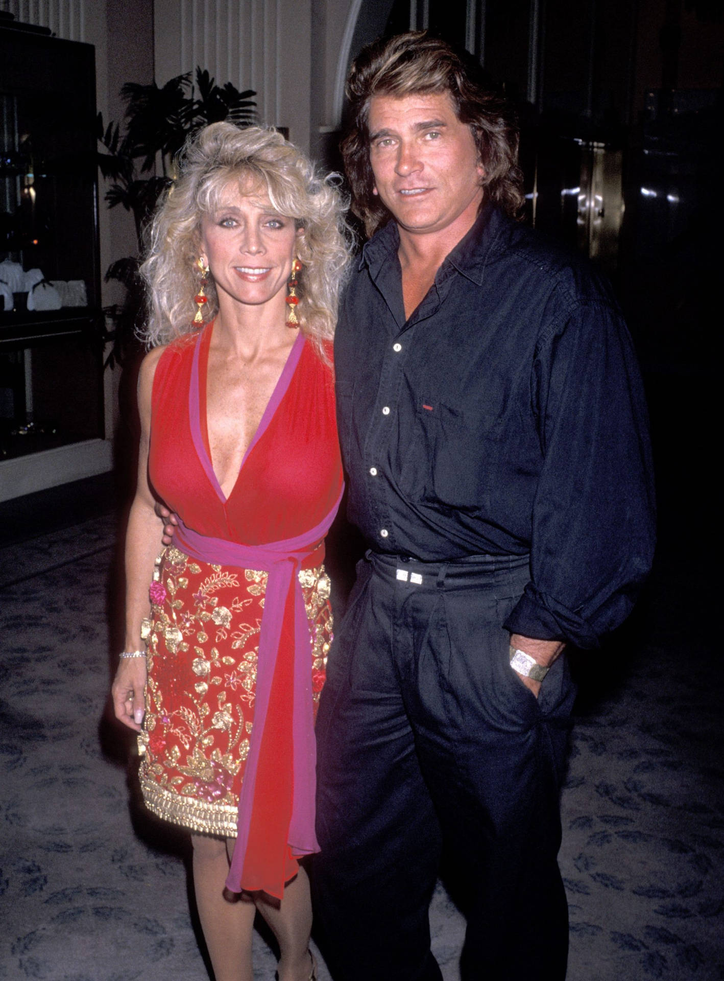 Caption: Michael Landon And Cindy Landon Smiling At A Public Event Background