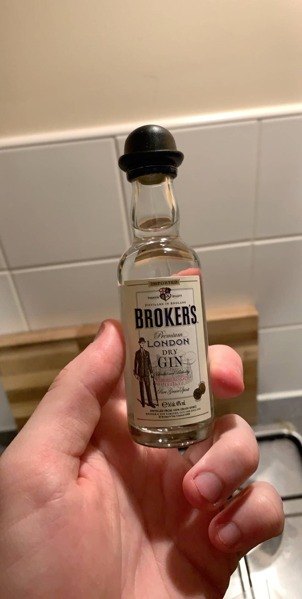 Caption: Miniature Brokers Gin Bottle Background