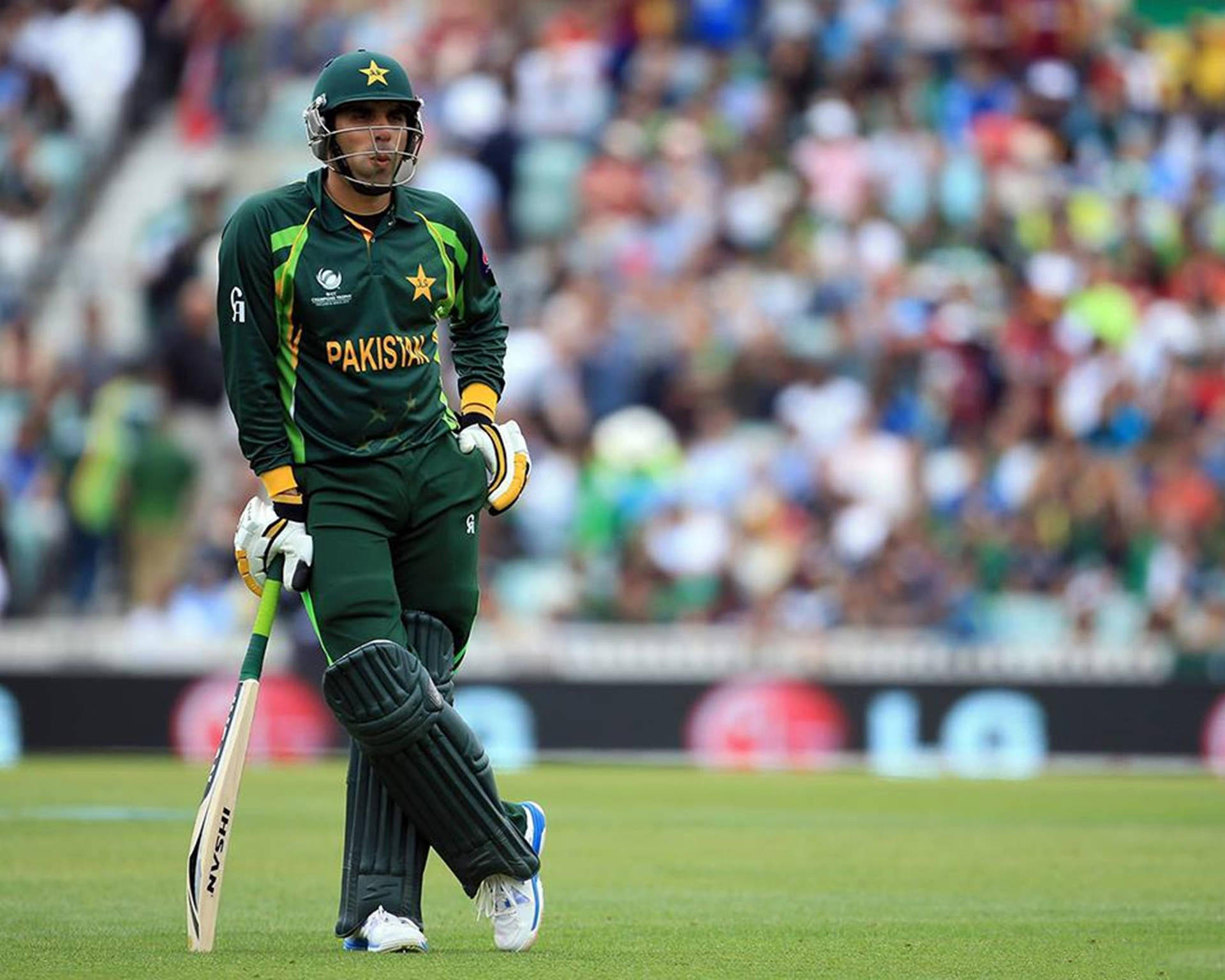 Caption: Misbah-ul-haq Of Pakistan Cricket Showing Determination On The Pitch.
