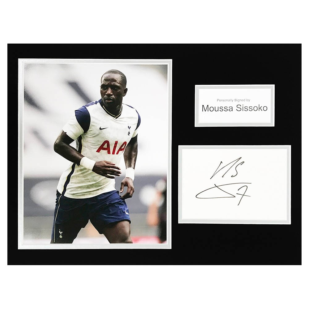 Caption: Moussa Sissoko Charging Forward In A Game Background