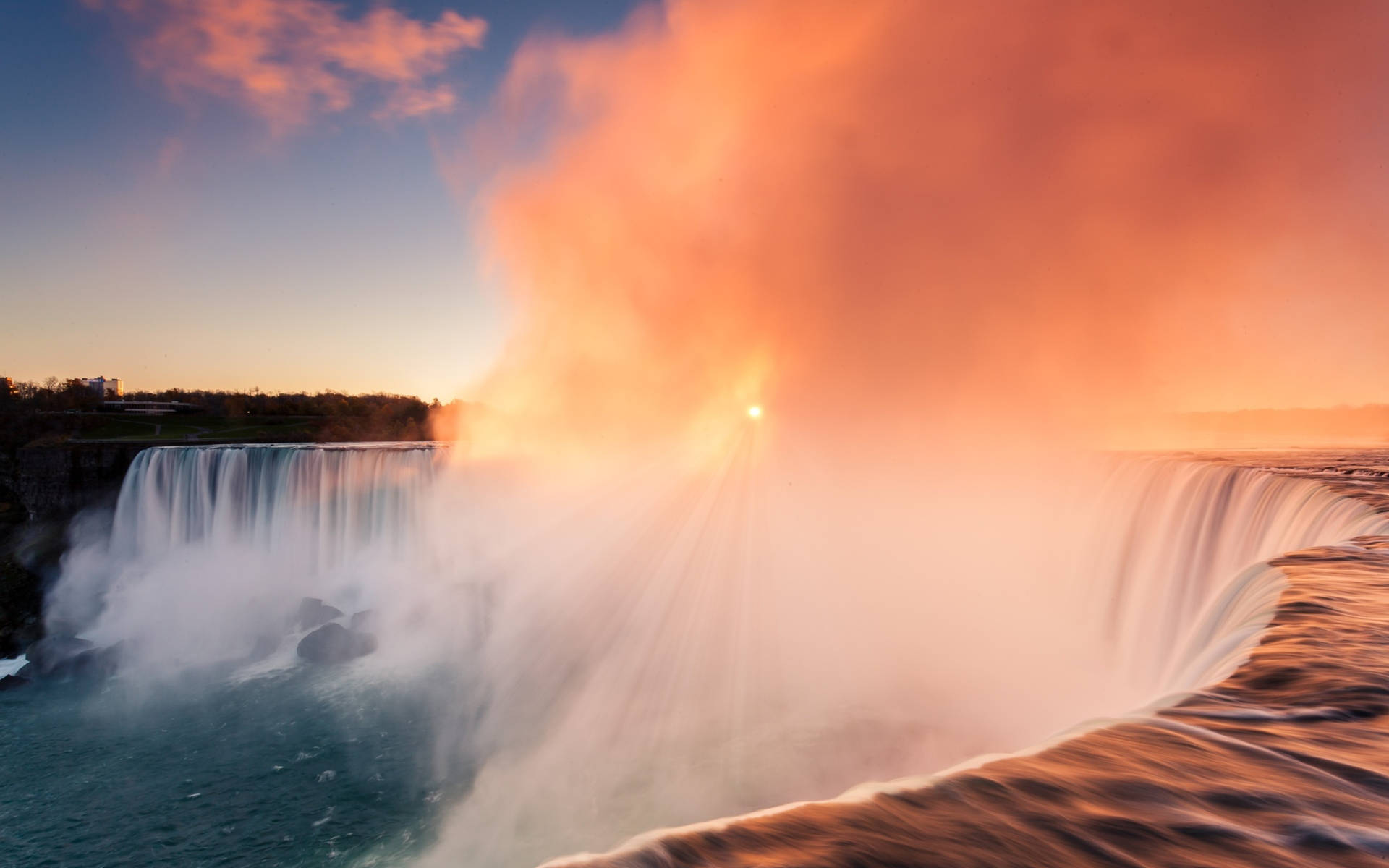Caption: Mystical Niagara Falls Shrouded In Heavenly Pink Mist Background