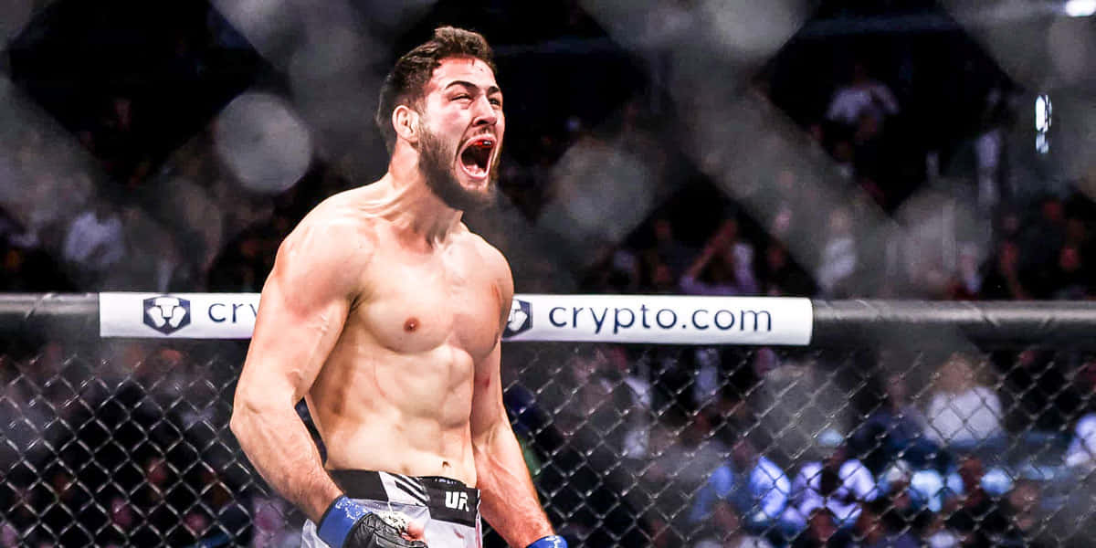 Caption: Nassourdine Imavov, Passionate Screaming In The Ring Background