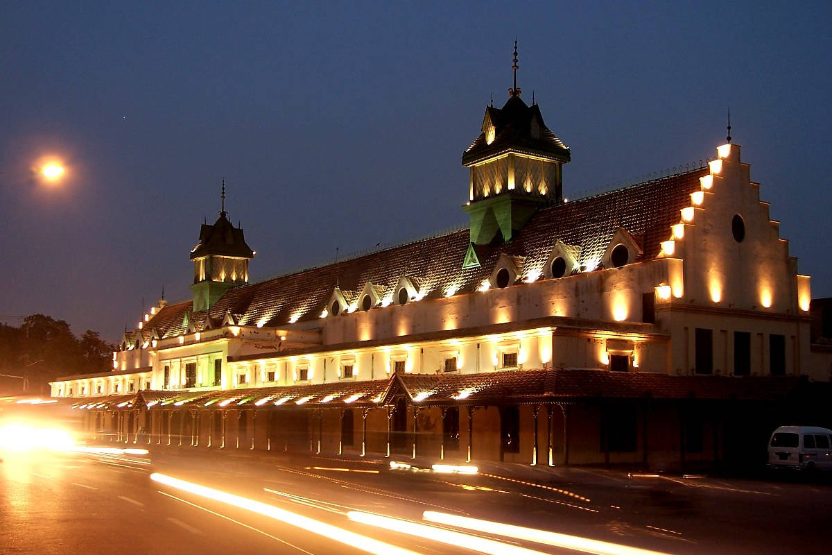 Caption: Night-time Splendor Of Lahore Hotels Background