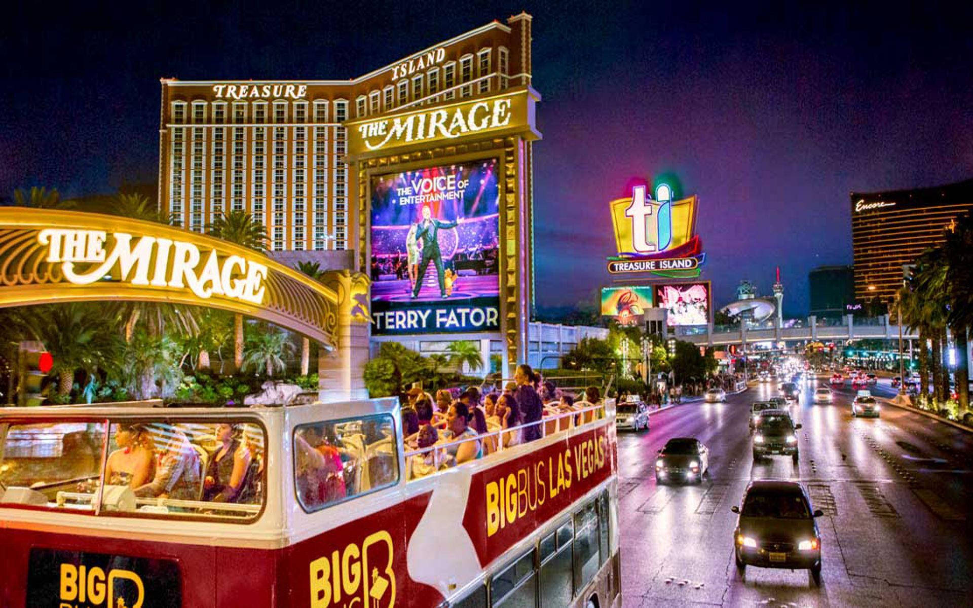 Caption: Nightlife Vibrance On The Las Vegas Strip Background