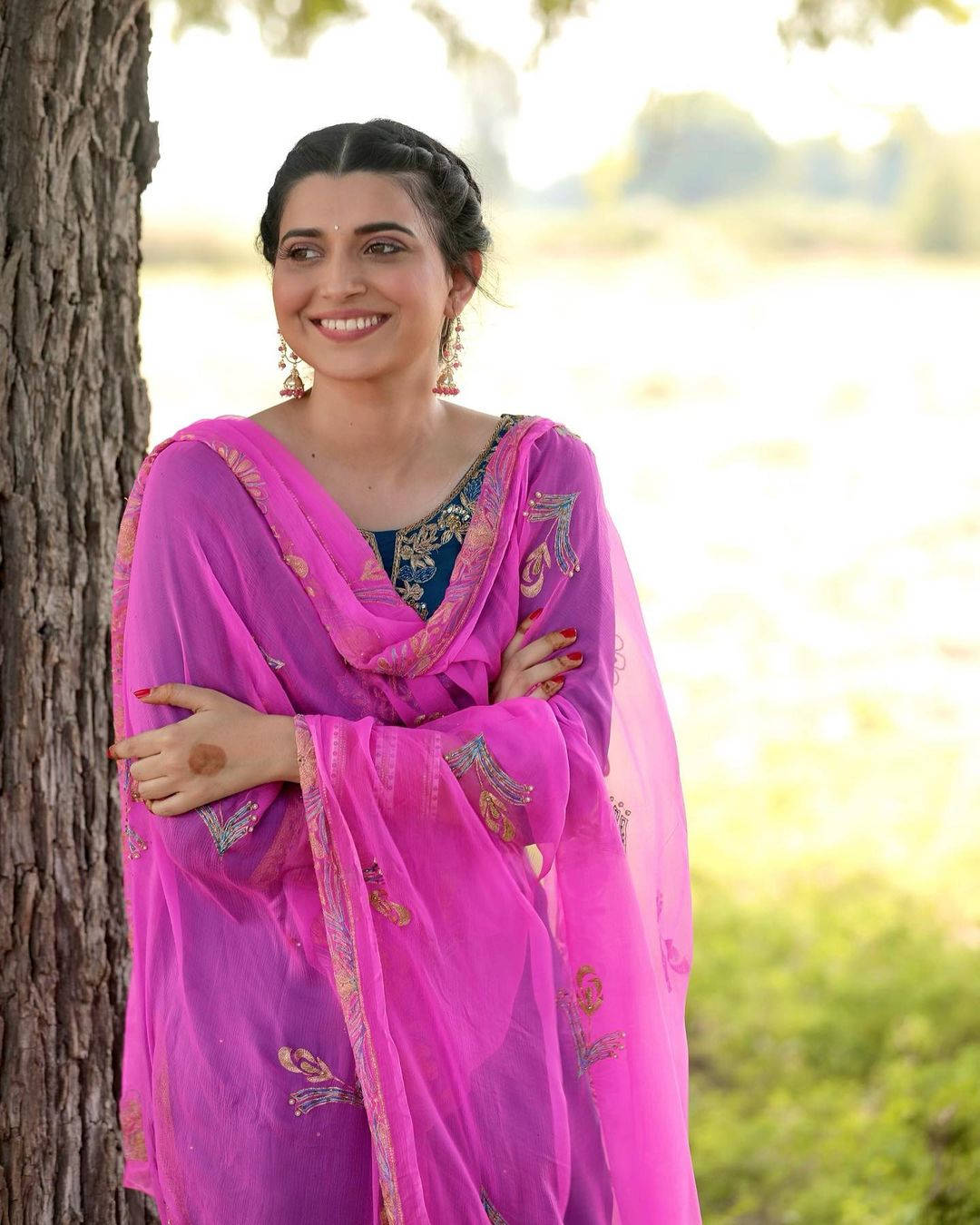 Caption: Nimrat Khaira Radiates Elegance In A Pink Shawl Background